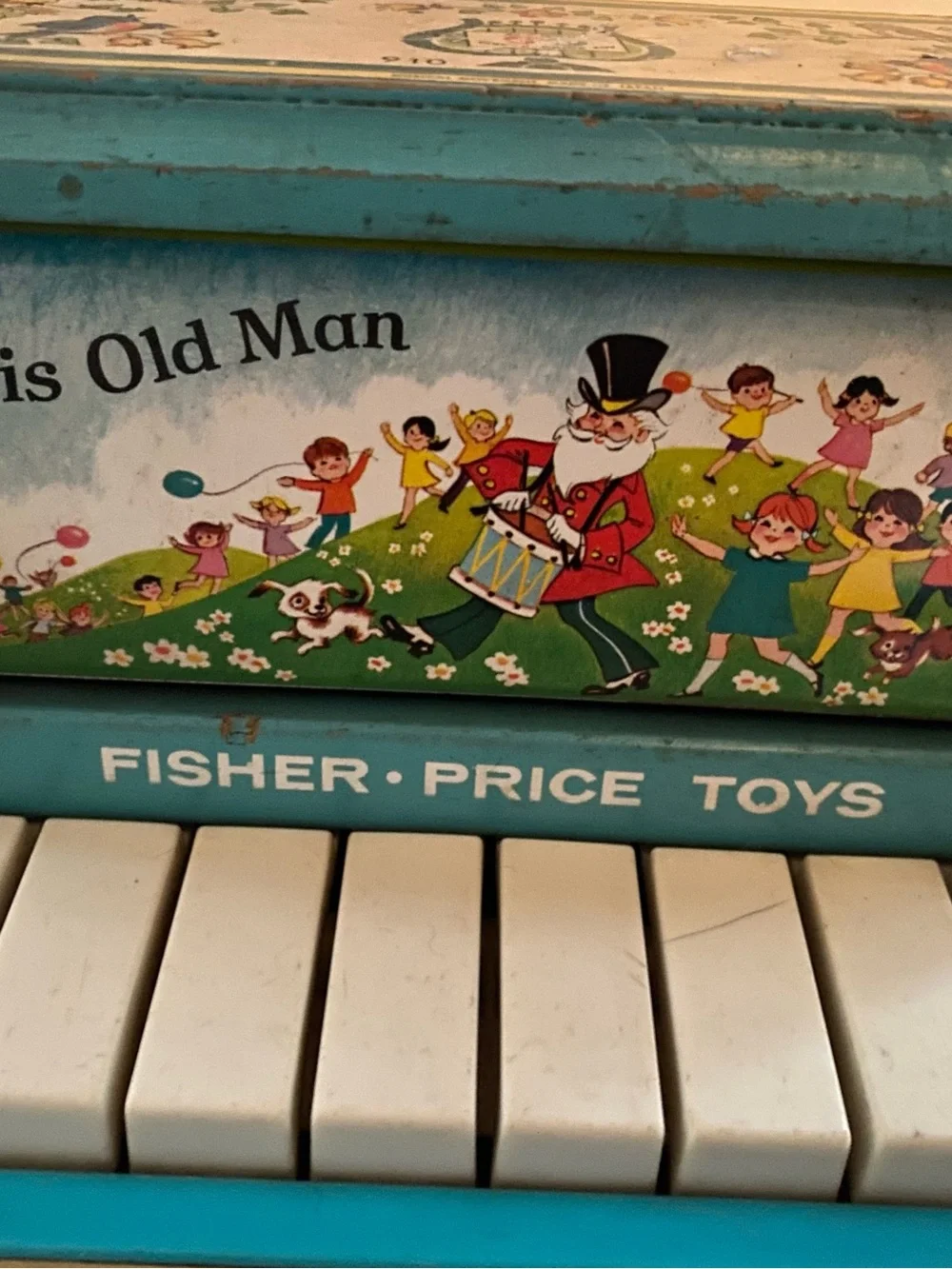 Fisher-Price Change-a-Tune Piano in Teal, Yellow and White